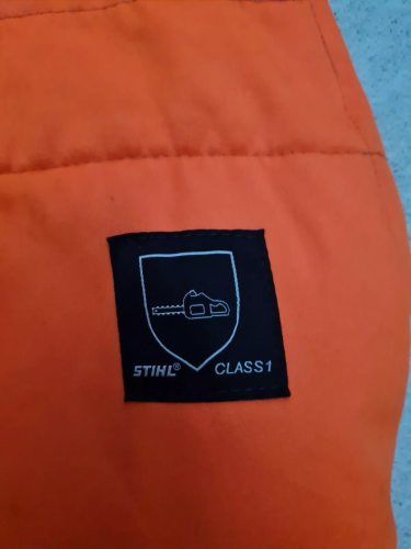 Stihl Schnittschutz Beinlinge orange Forstschutz Waldarbeiter rundum Forst THW